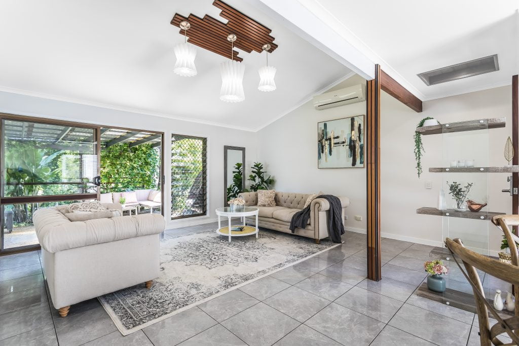 An open living room area with heaps of natural light sold by Penrose Real Estate Agents
