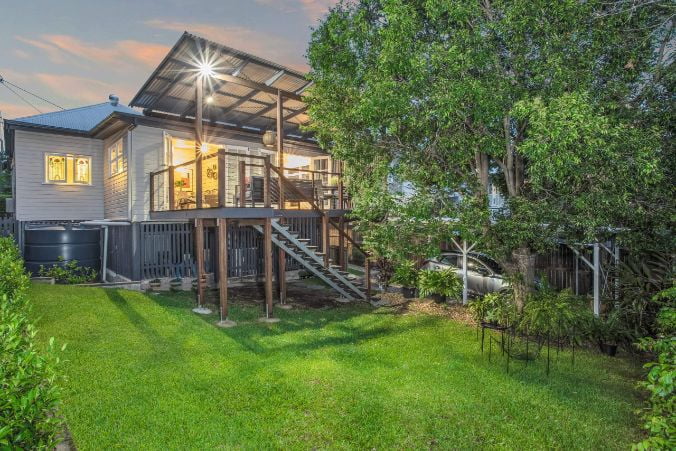 Green lawn and trees outside of Brisbane suburb home