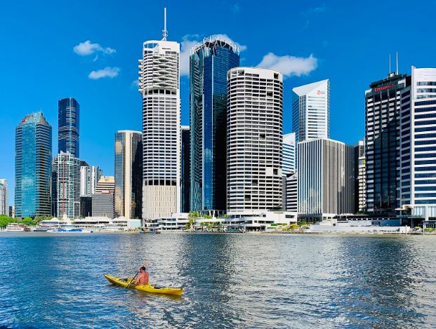 View of Brisbane CBD with kayak on river