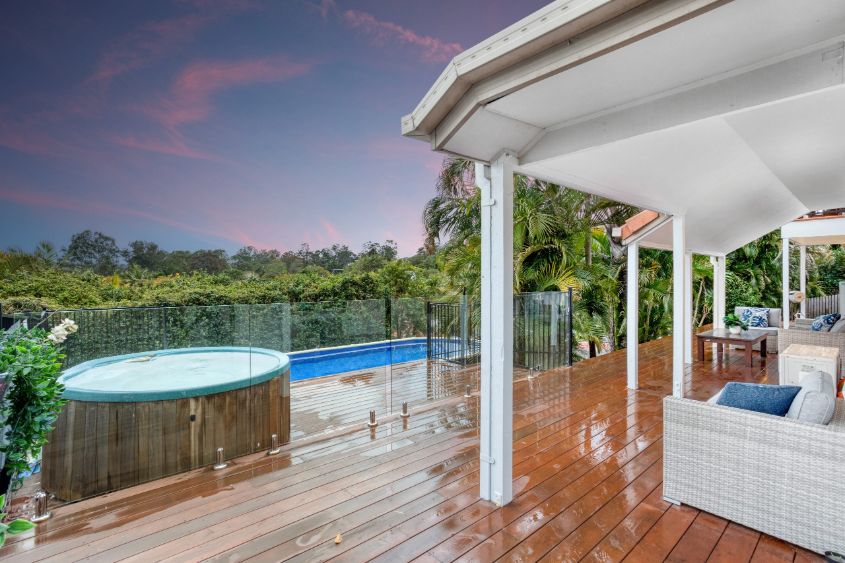 Pink and blue sky in background of Brisbane home