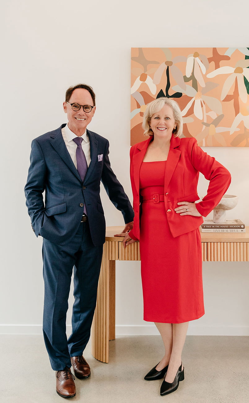 Two of Penrose's real estate agents, Christina and Grant.