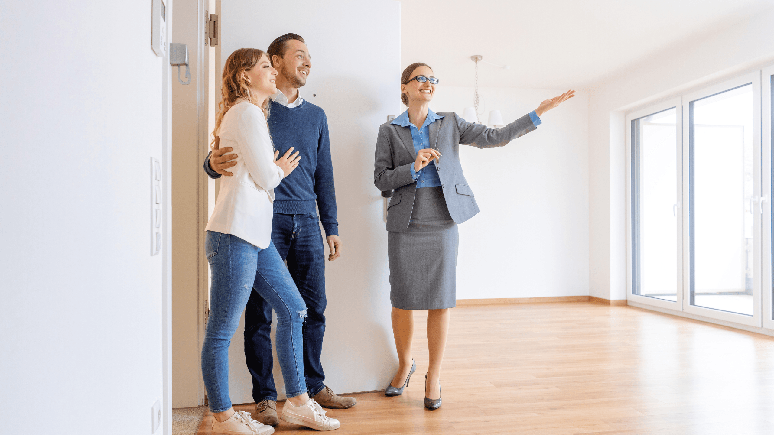 Tenants inspecting a rental property with a property manager.